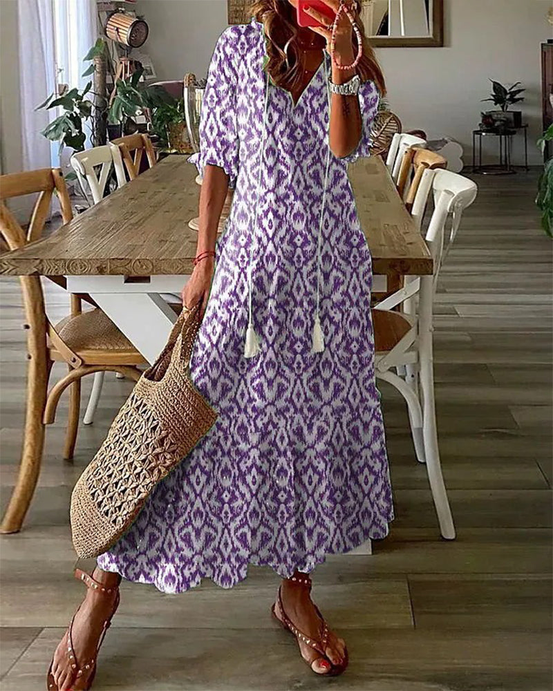 Robe longue imprimée à col en V et demi-manches