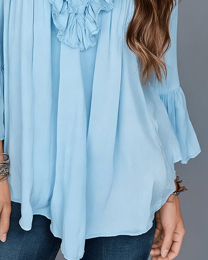 Blouse élégante à col en V à volants