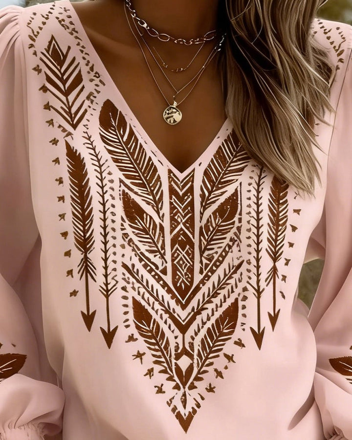 Blouse ample col en V à manches bouffantes
