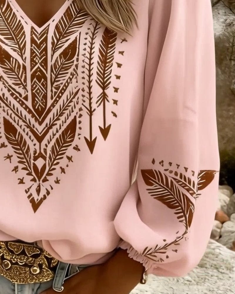 Blouse ample col en V à manches bouffantes