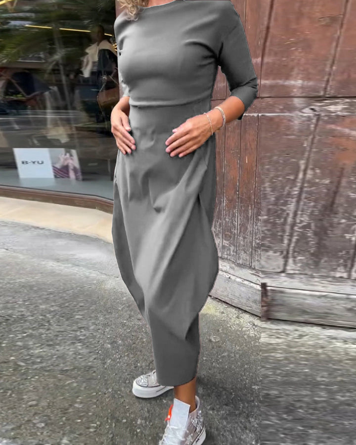Robe élégante à manches longues, poche et couleur unie simple