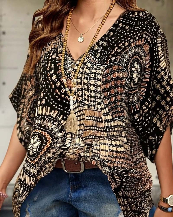 Blouse à col V imprimée à manches chauve-souris