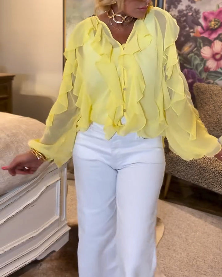 Chemise fluide à volants de couleur unie