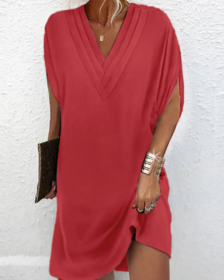 Robe élégante unie à manches fendues