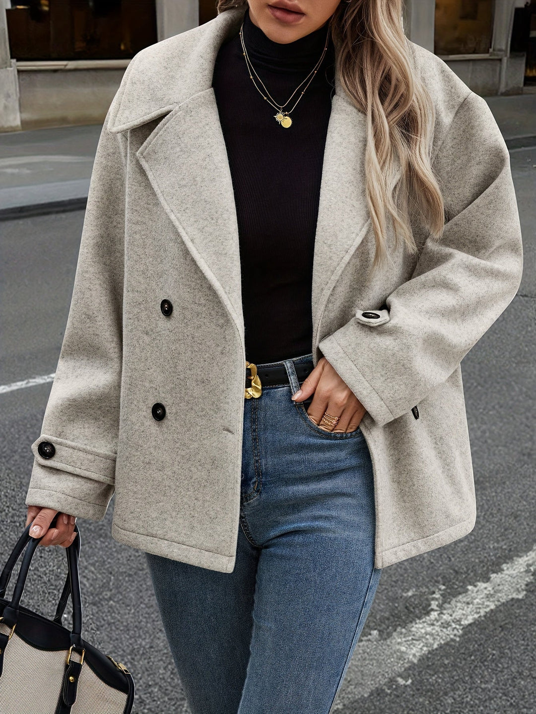 Veste élégante à double boutonnage et détails boutons