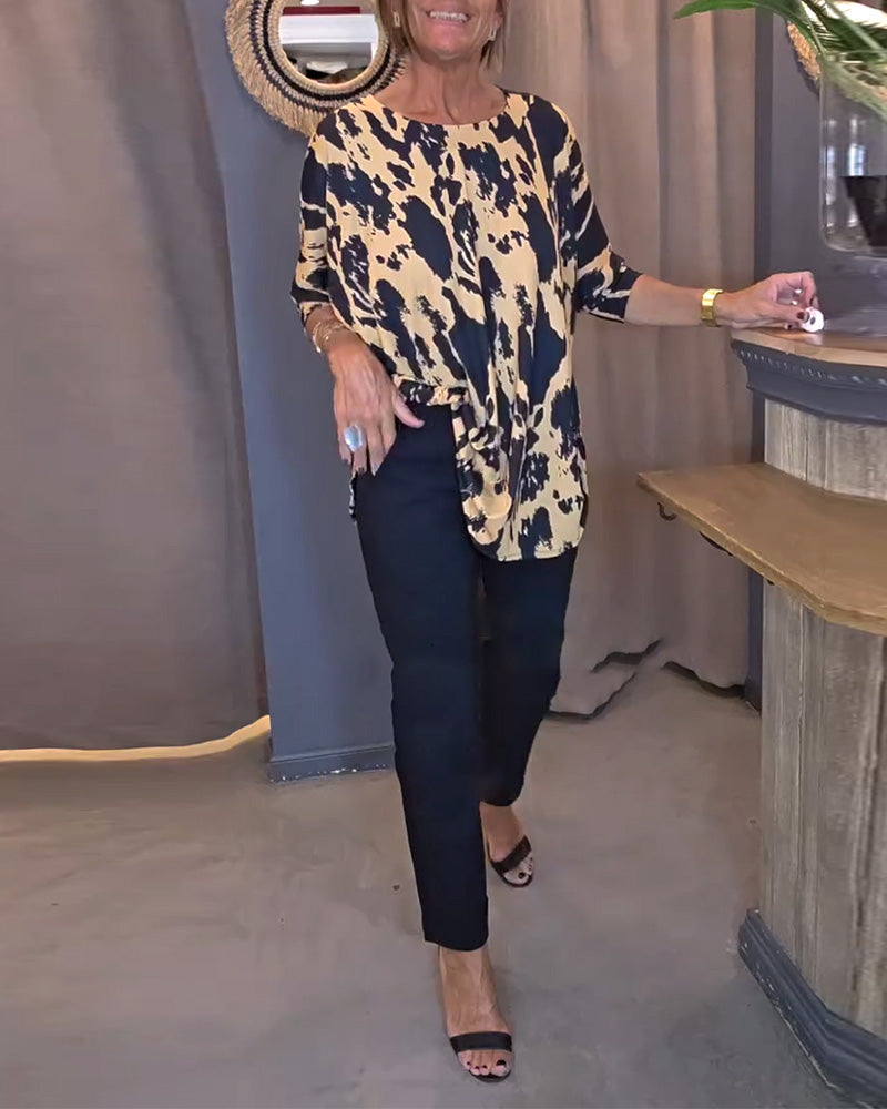 Blouse à fente imprimée avec col rond