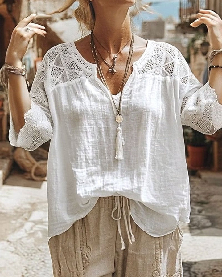 Blouse à col en V avec empiècements de couleur unie