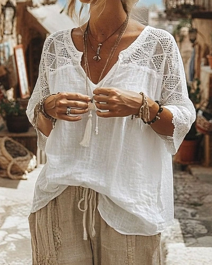 Blouse à col en V avec empiècements de couleur unie