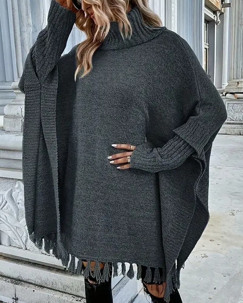Cardigan à col roulé, manches chauve-souris et pompons