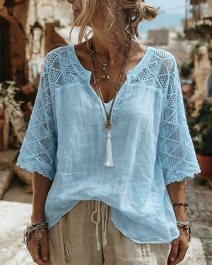 Blouse à col en V avec empiècements de couleur unie