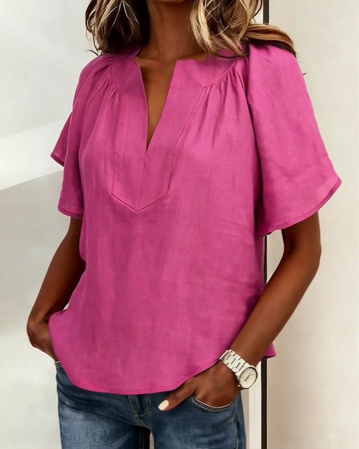 Blouse à manches raglan de couleur unie