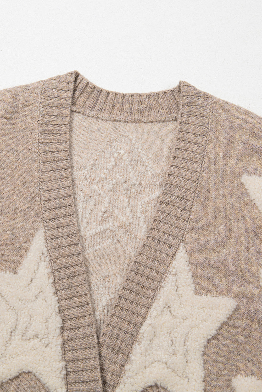 Cardigan Sherpa étoile à col en V avec poches