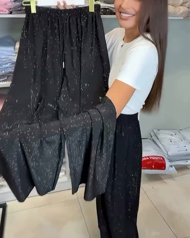 Pantalon large à taille haute, brillant et stylé
