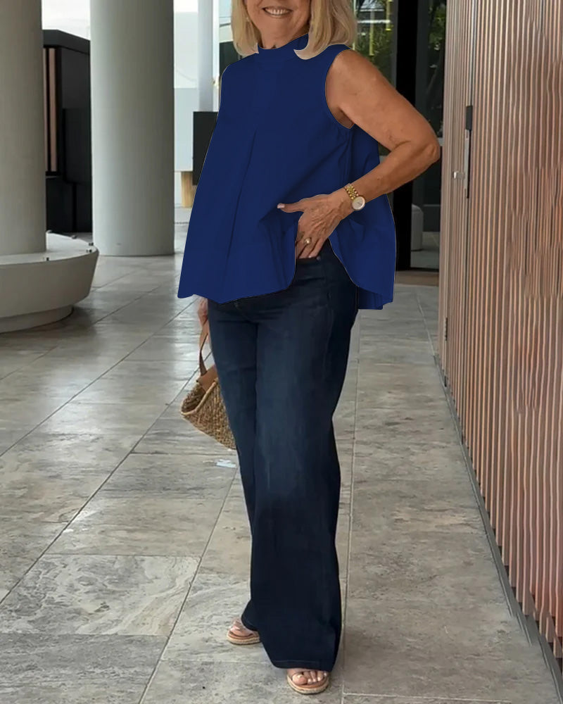 Blouse simple sans manches de couleur unie