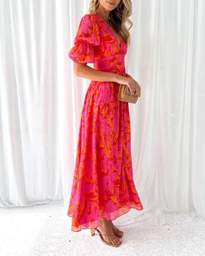 Robe longue élégante à col V et manches bouffantes