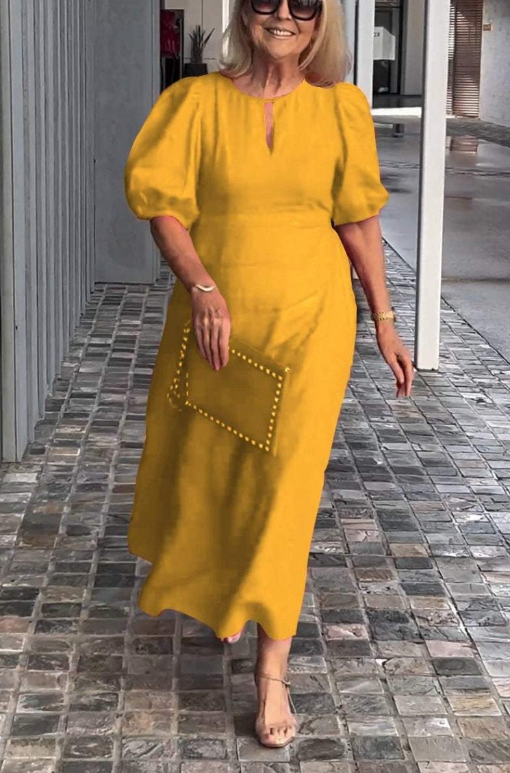 Robe élégante avec manches bouffantes Statement