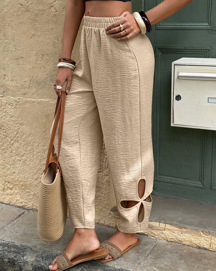 Pantalon décontracté à motif floral texturé et ourlet découpé