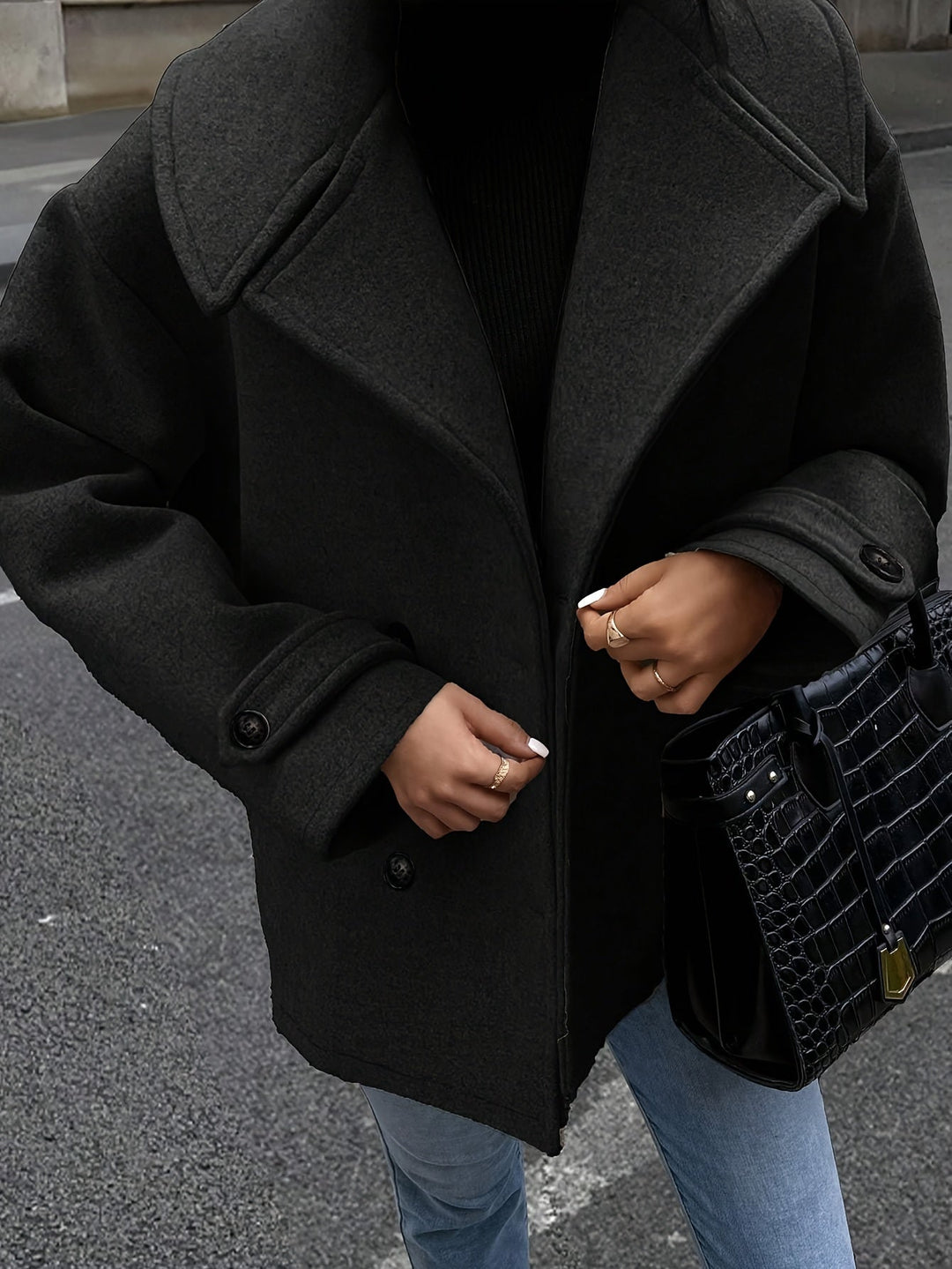 Veste élégante à double boutonnage et détails boutons