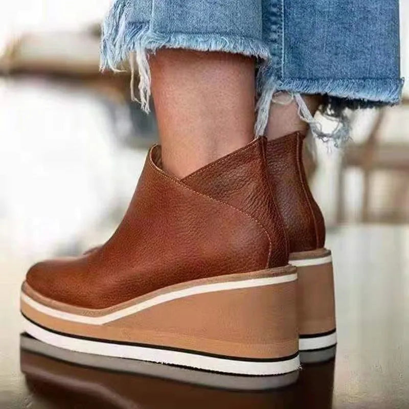 Bottes imperméables élégantes avec fermeture éclair