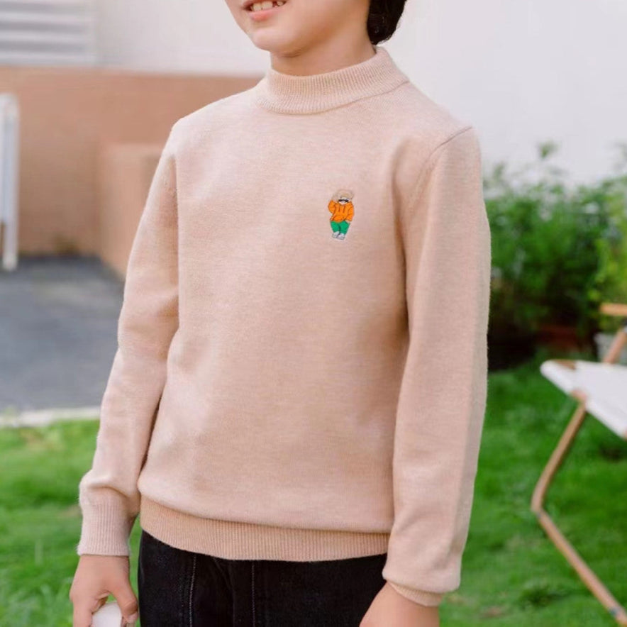 Pull enfant à col semi-roulé