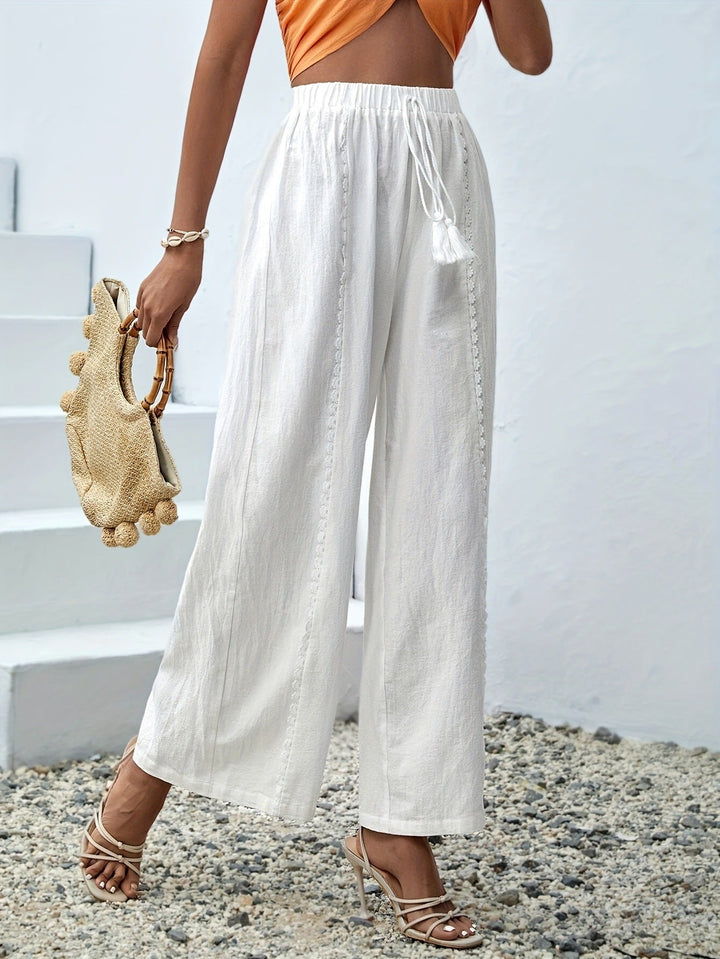 Pantalon chic à taille haute avec franges