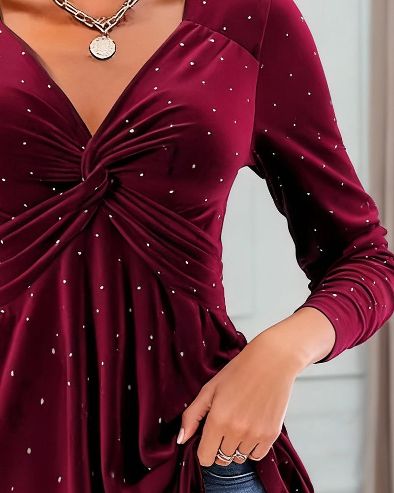 Haut à col en V avec design nœud pailleté