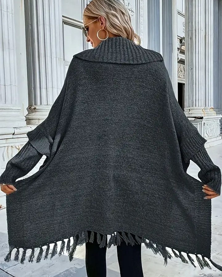 Cardigan à col roulé, manches chauve-souris et pompons