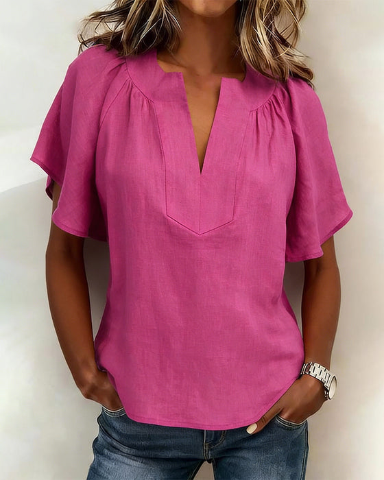 Blouse à manches raglan de couleur unie