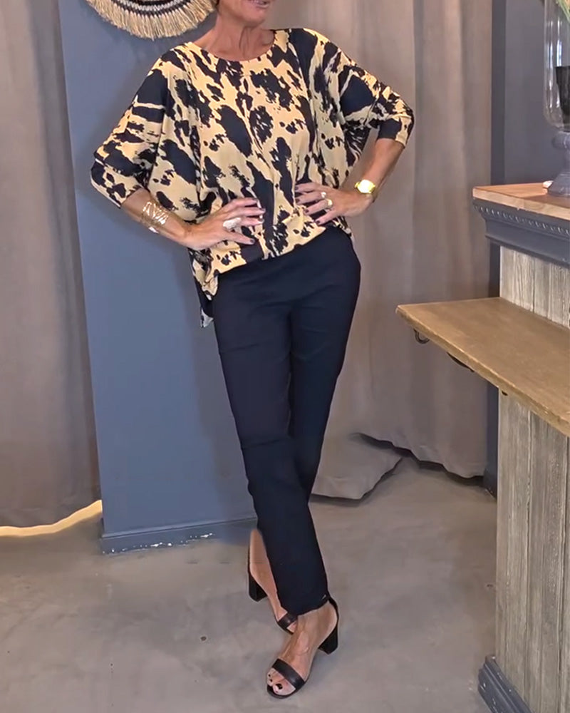 Blouse à fente imprimée avec col rond