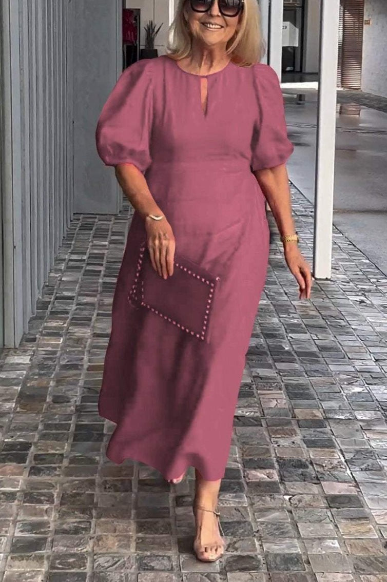 Robe élégante avec manches bouffantes Statement