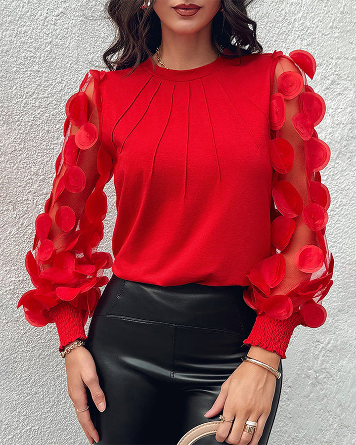 Blouse plissée à manches décoratives tridimensionnelles