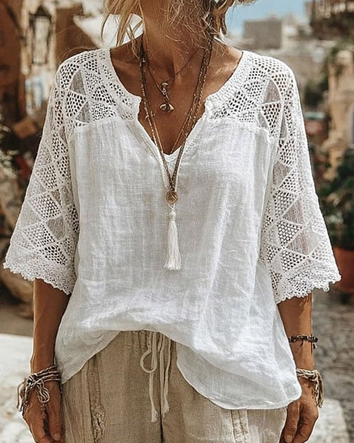 Blouse à col en V avec empiècements de couleur unie