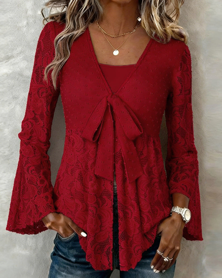 Blouse à col en V et manches cloche de couleur unie