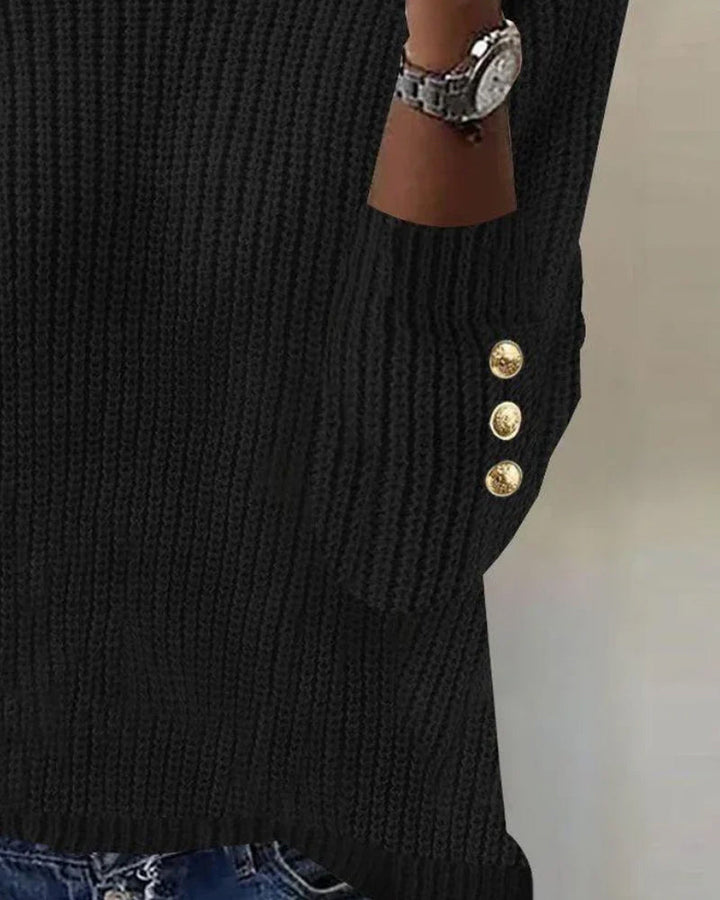 Pull à col montant avec boutons métalliques