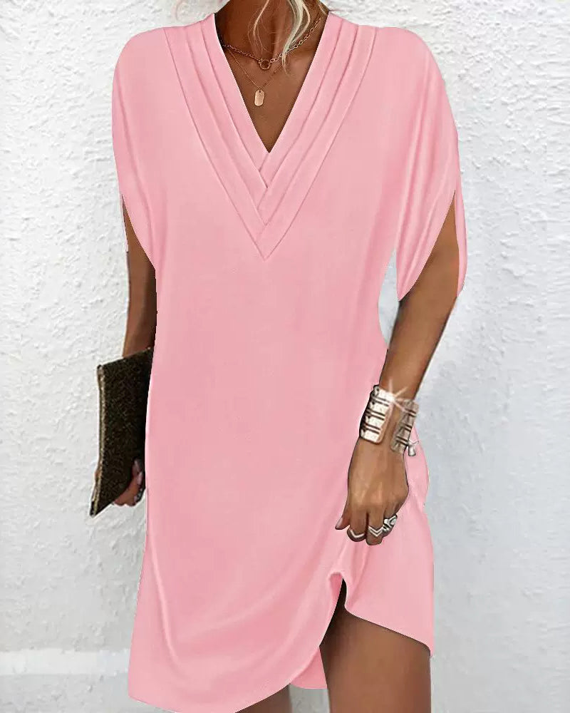 Robe élégante unie à manches fendues